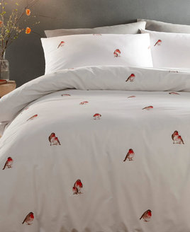 Crisp white backgroung patterend with cute Christmas Robins.
