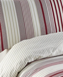 Cosy flannelette red and white sized stripes, with a reverse of off-white with thin gold stripes.