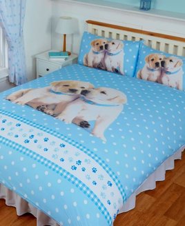 Adorable Labrador Puppies Duvets. 2 puppies on a pale blue and white patterned background