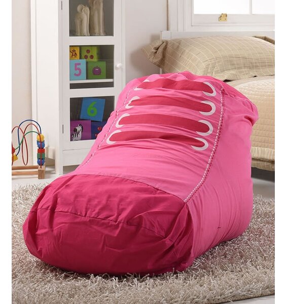 pink and white trainer shaped bean bag