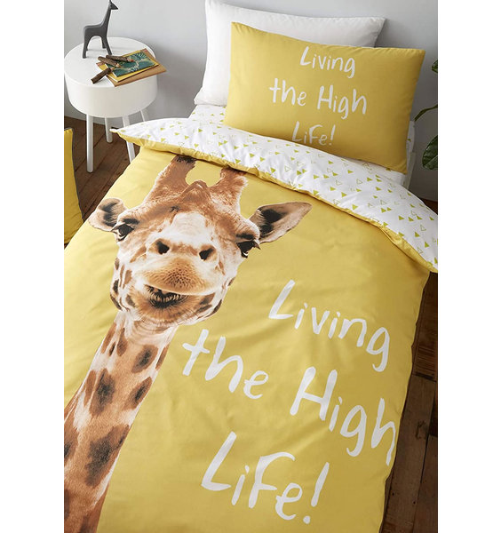 Cute smilling giraffe, living the high life on a natural yellow background.