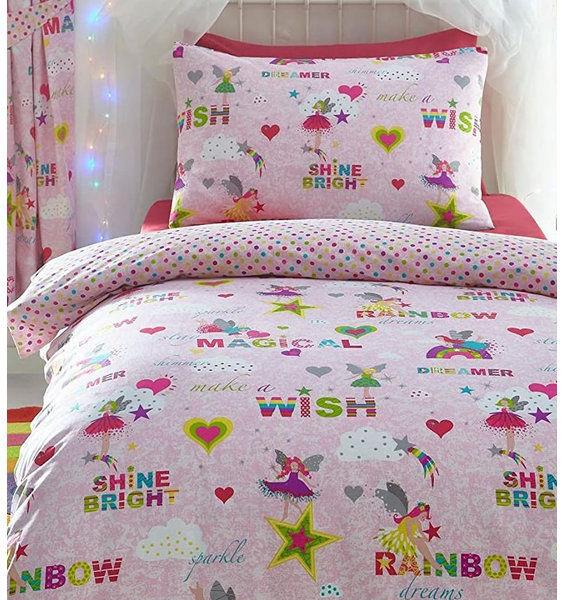 Pink duvet covers sprinkled with cute fairies and the words 'magical', 'shine bright' and 'make a wish'.