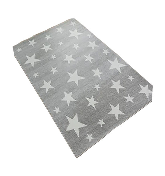 large pale grey rug patterned with small, medium and white, five point stars.