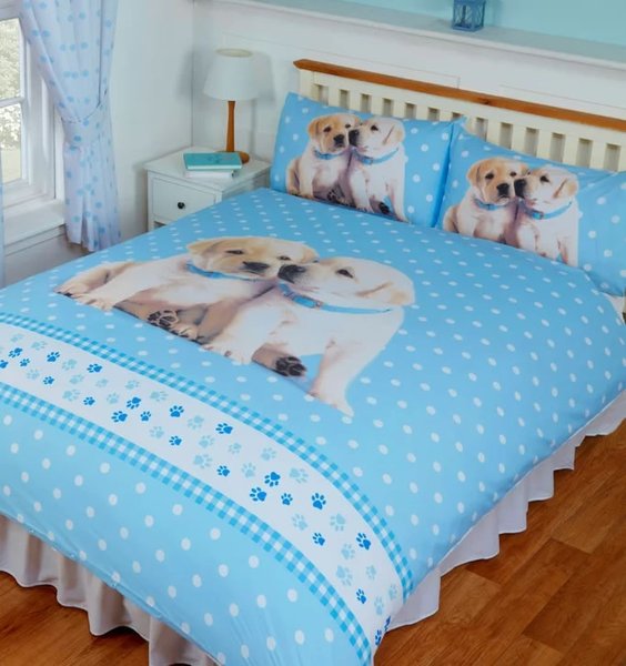 Adorable Labrador Puppies Duvets. 2 puppies on a pale blue and white patterned background