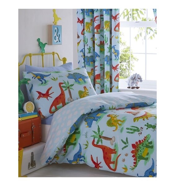 Kids Colouful Dinosaur Bedding Set with a Pale Blue Background. The reverse is a blue and white cloud design.