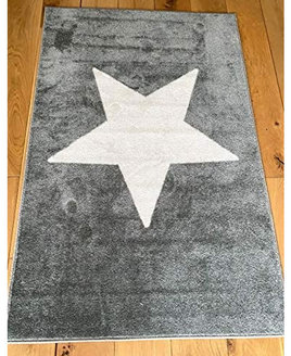 Grey rug with a large white star placed in the centre.