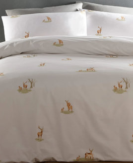 Deer on white bedding